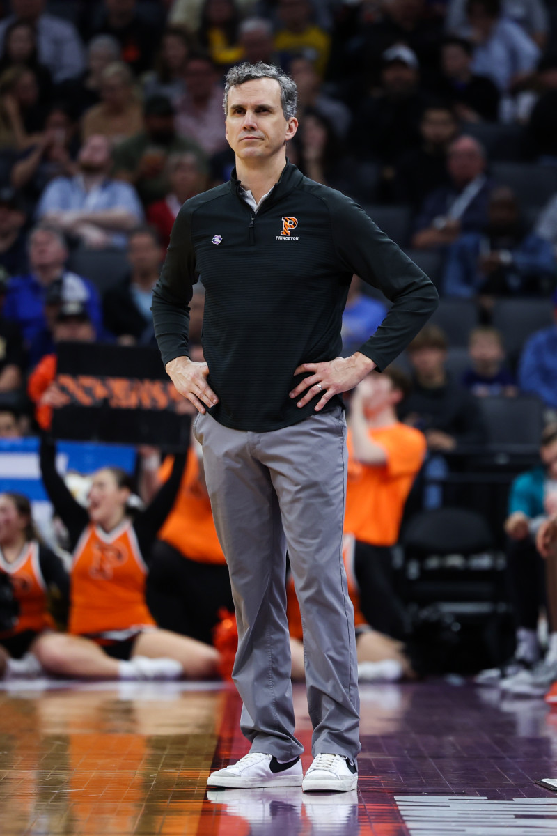 Princeton coach Mitch Henderson looks on at his team from the sidelines.