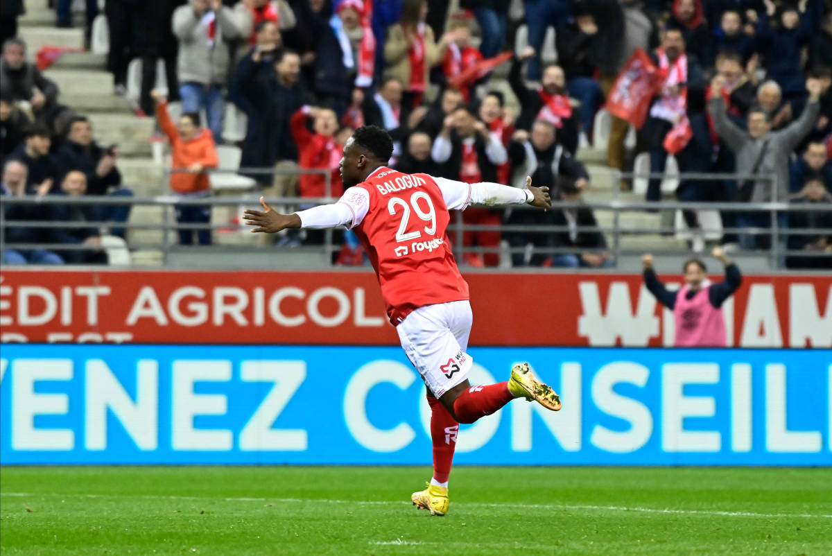 Folarin Balogun pictured celebrating a goal for Reims against Marseille in March 2023