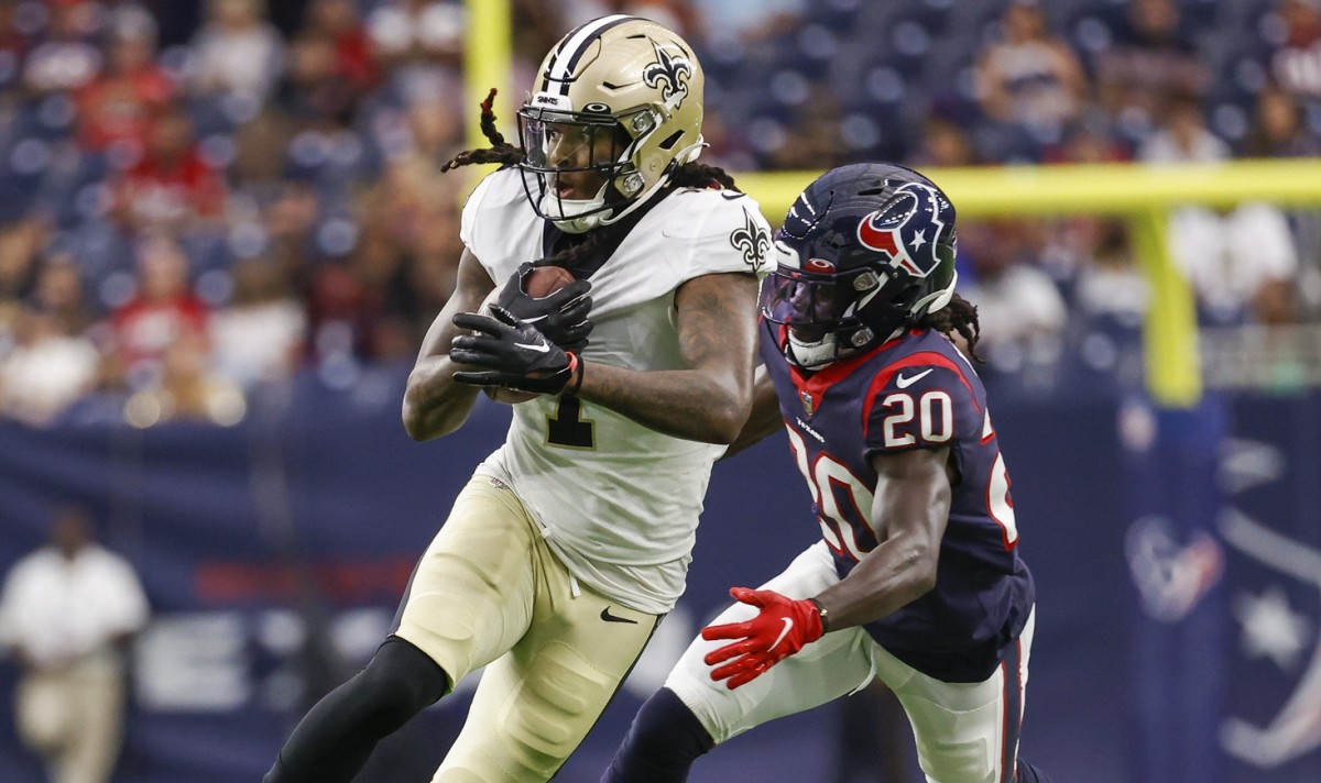 New Orleans Saints wide receiver Marquez Callaway (1) runs with the ball after a reception as Houston Texans cornerback Isaac Yiadom (20) attempts to make a tackle during the first quarter at NRG Stadium.