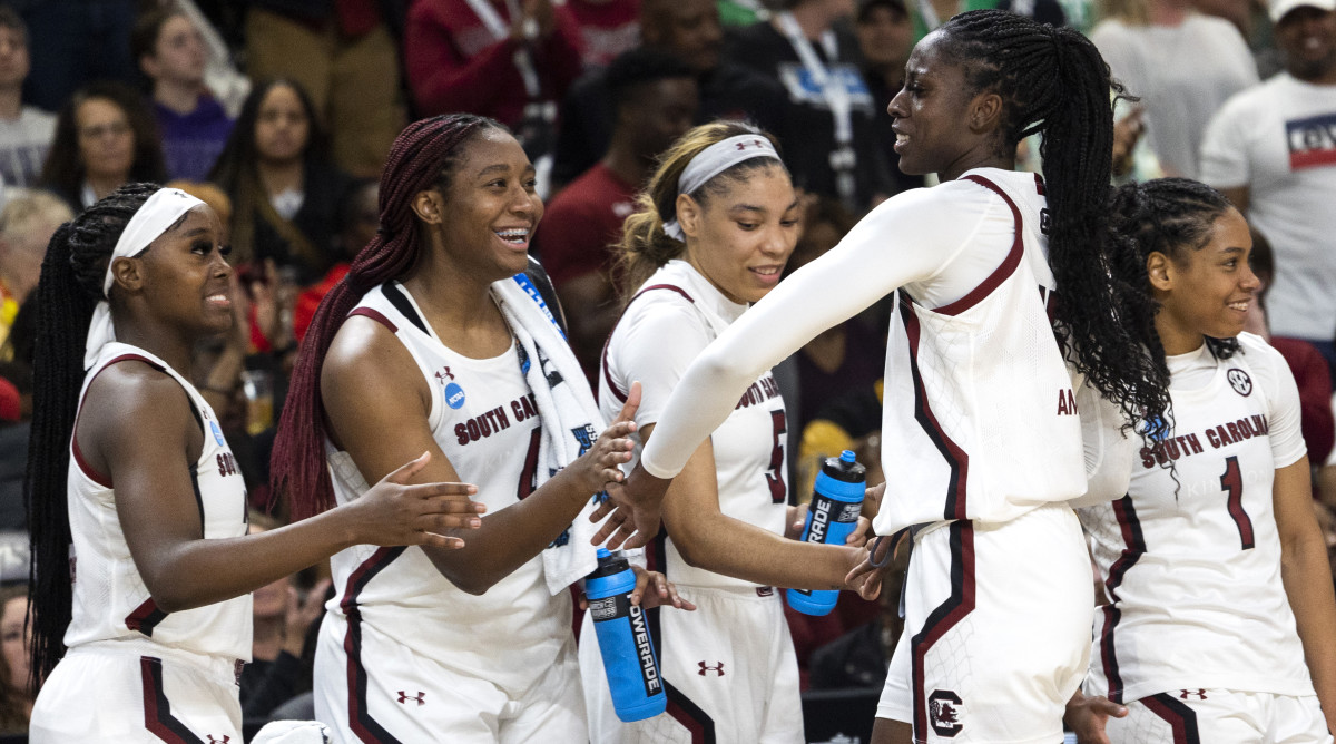 South Carolina’s Laeticia Amihere celebrates with her teammates in the closing moments against UCLA in the Sweet 16 of the NCAA women’s tournament.