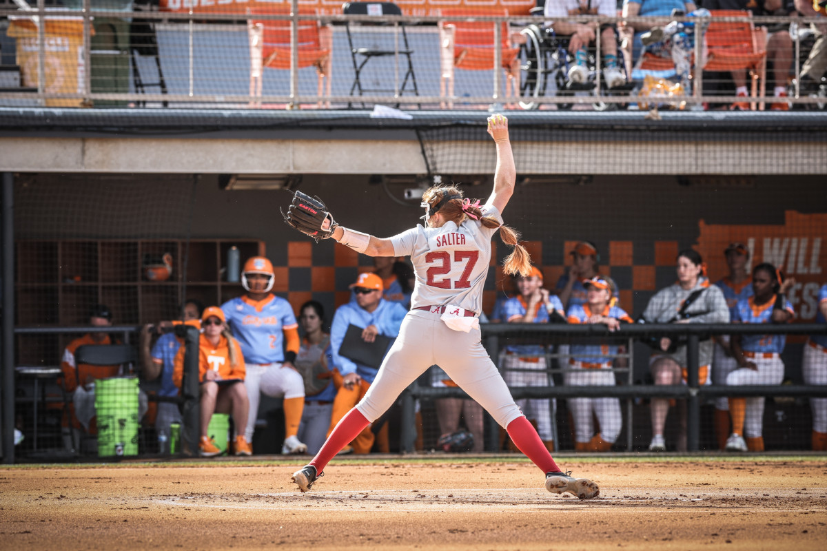 Alabama RHP Alex Salter (27) throws a pitch in the Crimson Tide's 4-2 win over the No. 3 Tennessee Lady Volunteers on March 25, 2023 at Sherri Parker Lee Stadium in Knoxville, Tenn.