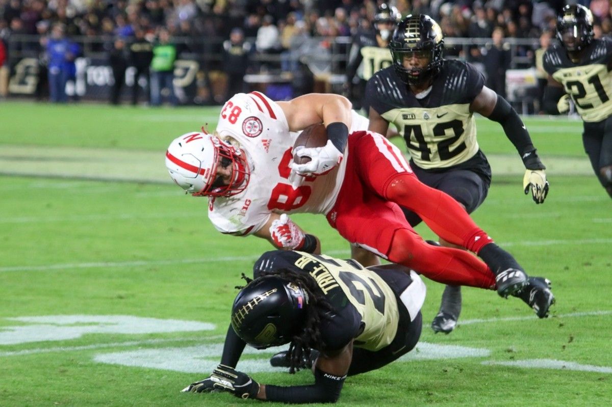 Travis Vokolek (83) catches a pass during the NCAA football game, Saturday, Oct, 15, 2022, at Ross-Ade Stadium in West Lafayette, Ind. Travis Vokolek 83is Taken Down By Purdue Dfender During The Ncaa Football Game Saturday Oct 15 2022 At Ross Ade Stadium In West Lafayette Ind