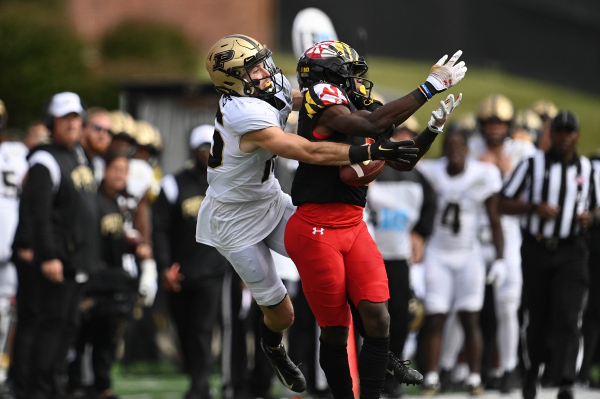 Oct 8, 2022; College Park, Maryland, USA; Purdue Boilermakers wide receiver Charlie Jones (15) knocks the ball away from Maryland Terrapins defensive back Jakorian Bennett (2) during the second half at SECU Stadium. Mandatory Credit: Tommy Gilligan-USA TODAY Sports