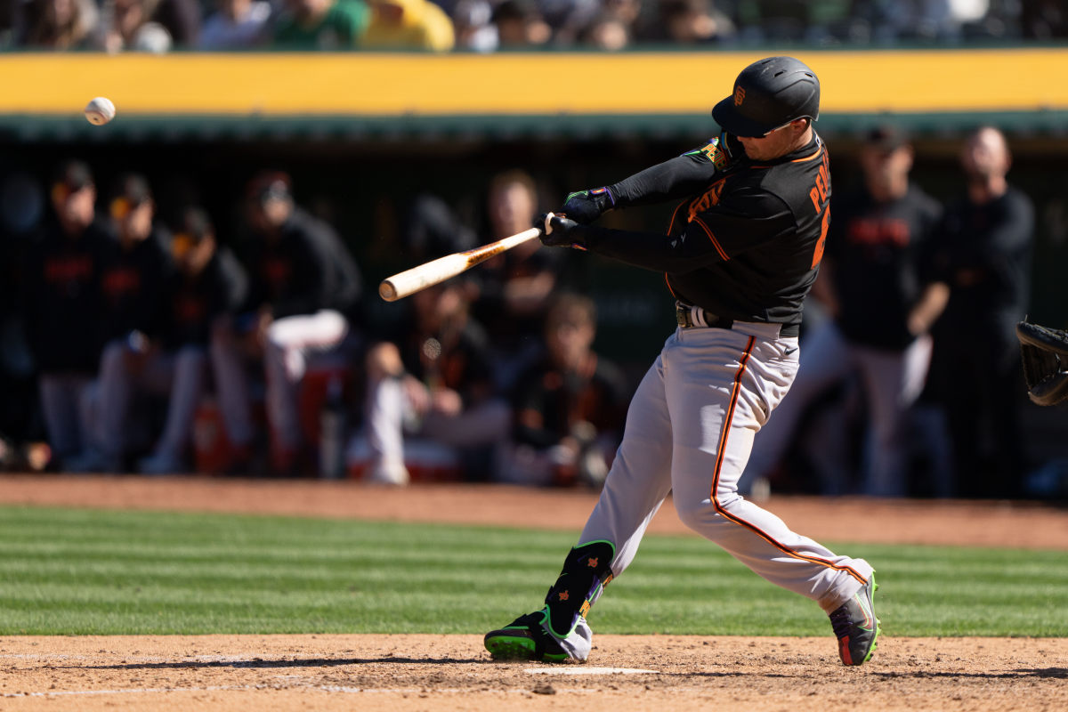 SF Giants left fielder Joc Pederson hits a home run during the eighth inning against the Oakland Athletics. (2023)