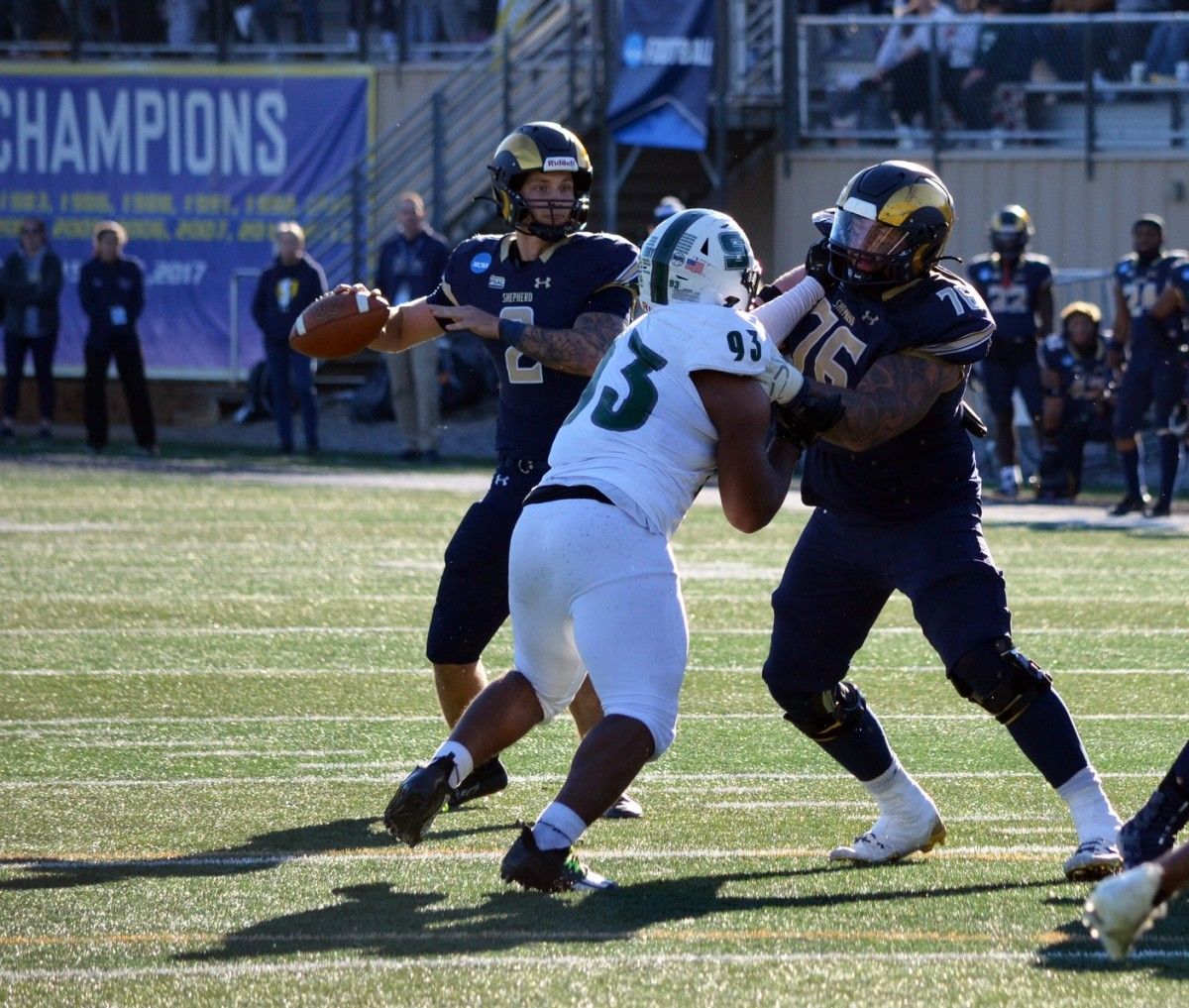 Shepherd quarterback Tyson Bagent is protected by lineman Joey Fisher as he looks to pass against Slippery Rock in their NCAA Division II second-round playoff game. Bagent And Fisher