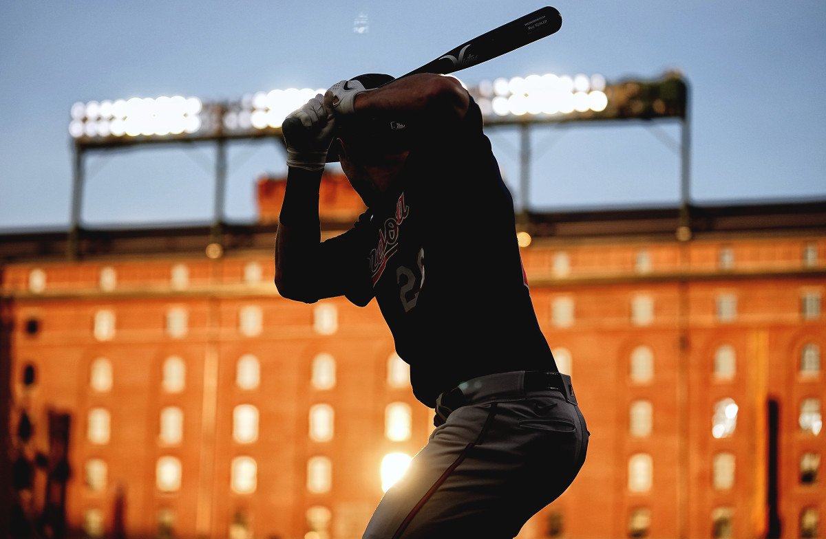 A silhouetted batter at Camden Yards