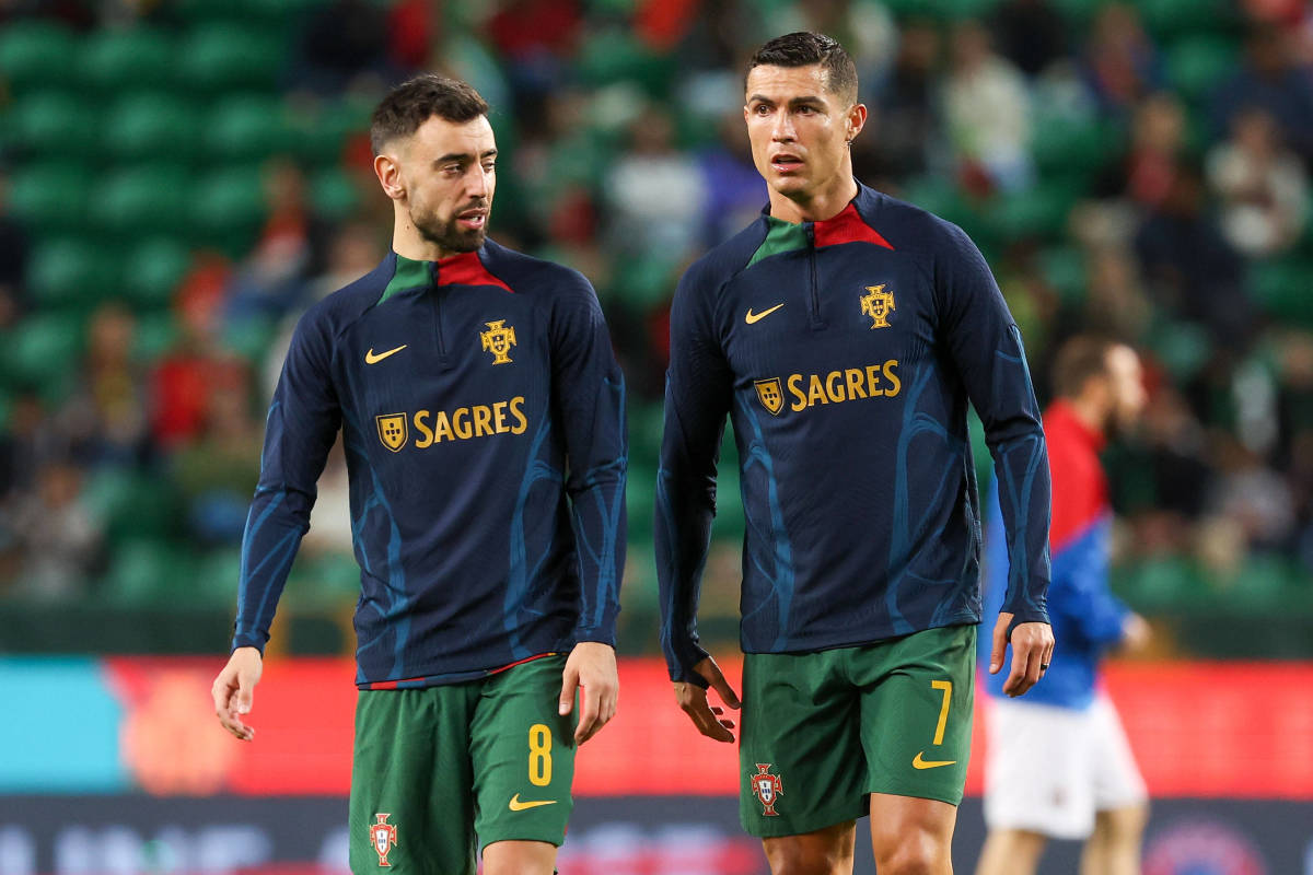 Bruno Fernandes (left) and Cristiano Ronaldo pictured warming up ahead of Portugal's game against Lichtenstein in March 2023