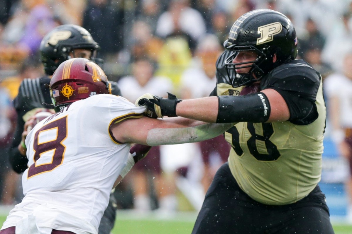Purdue offensive lineman Cam Craig (68) blocks Minnesota defensive lineman Thomas Rush (8) during the first quarter of an NCAA college football game, Saturday, Oct. 2, 2021 at Ross-Ade Stadium in West Lafayette, Ind. Cfb Purdue Vs Minnesota
