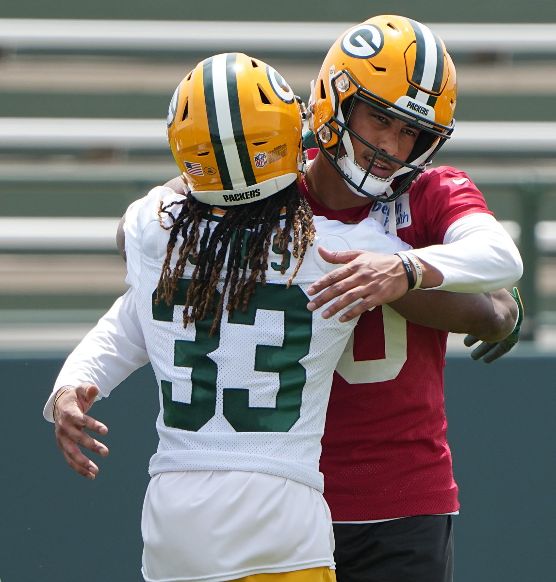 Jordan Love and Aaron Jones embrace before the start of OTAs in May 2022. (Photo by Mark Hoffman/USA Today Sports Images)