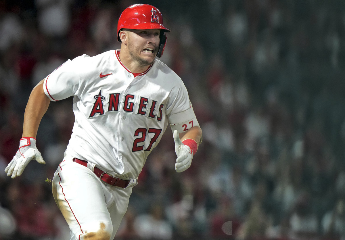 Mike Trout runs to first base after making a double for the Angels.