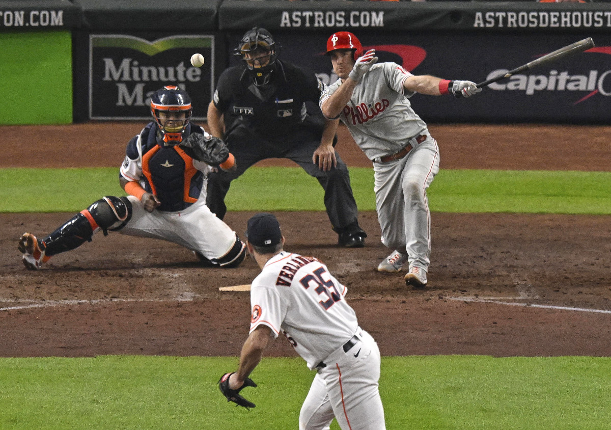 J.T. Realmuto gets a hit off Justin Verlander in last season’s World Series.