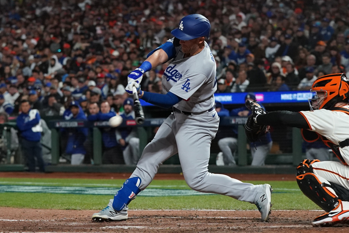Los Angeles Dodgers pinch hitter Matt Beaty drives in a run with a single against the SF Giants in the eighth inning during game two of the 2021 NLDS at Oracle Park.