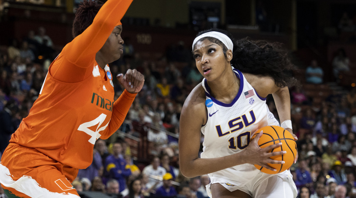 LSU’s Angel Reese goes up to shoot over Miami’s Kyla Oldacre in the the Elite Eight of the NCAA women’s tournament.