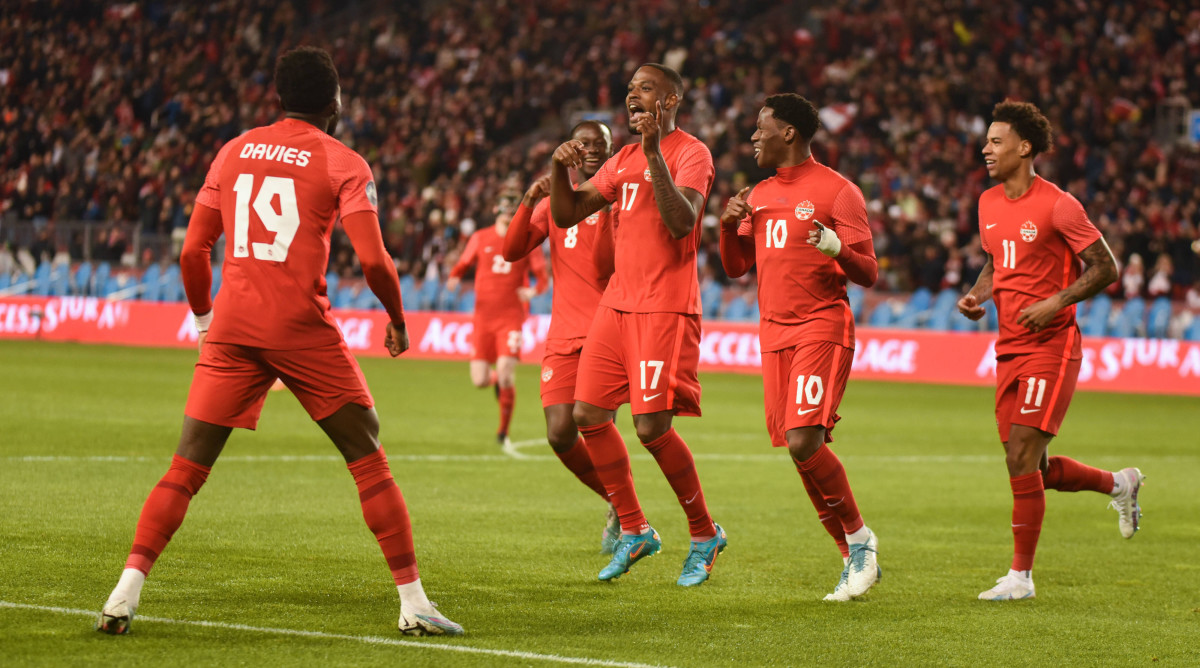 Canada celebrates a goal vs. Honduras.