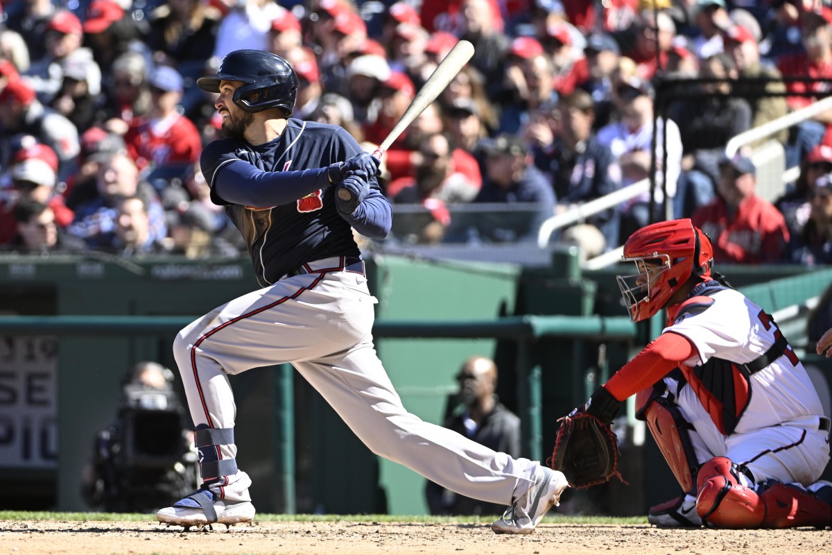 Mar 30, 2023; Washington, District of Columbia, USA; Atlanta Braves catcher Travis d'Arnaud (16) singles against the Washington Nationals during the sixth inning at Nationals Park.