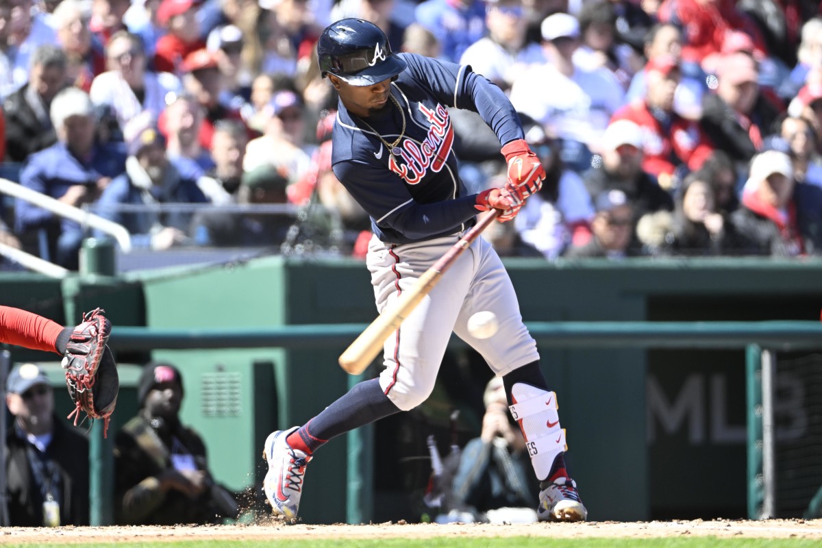 Mar 30, 2023; Washington, District of Columbia, USA; Atlanta Braves second baseman Ozzie Albies (1) hits an RBI single against the Washington Nationals during the second inning at Nationals Park. Mandatory Credit: Brad Mills-USA TODAY Sports