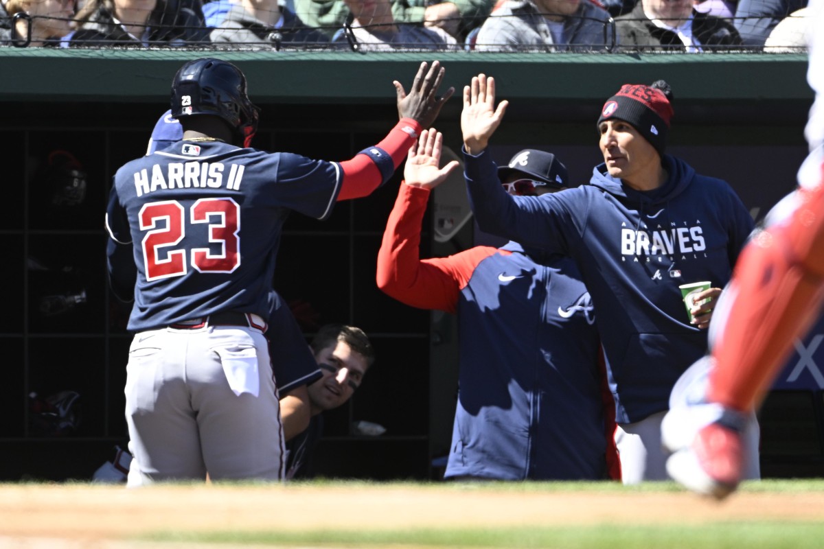 Mar 30, 2023; Washington, District of Columbia, USA; Atlanta Braves center fielder Michael Harris II (23) is congratulated by teammates after scoring a run against the Washington Nationals during the second inning at Nationals Park. Mandatory Credit: Brad Mills-USA TODAY Sports