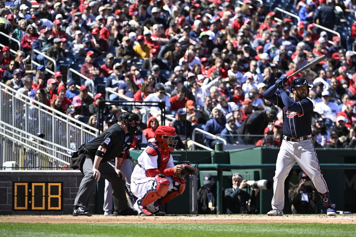 Mar 30, 2023; Washington, District of Columbia, USA; Atlanta Braves catcher Travis d'Arnaud (16) at bat with the pitch clock showing against the Washington Nationals during the second inning at Nationals Park. Mandatory Credit: Brad Mills-USA TODAY Sports