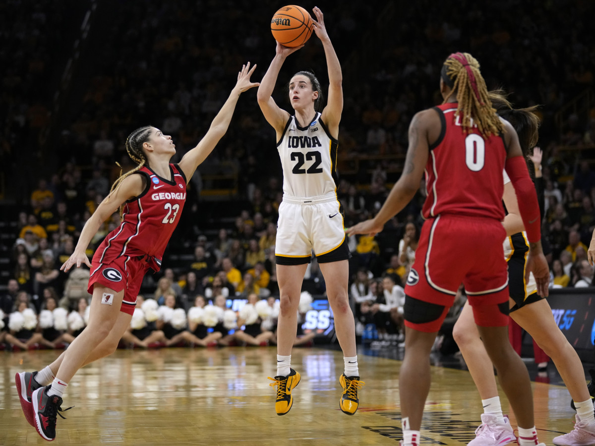 Iowa guard Caitlin Clark shoots over Georgia guard Alisha Lewis in the second round of the NCAA women’s tournament.