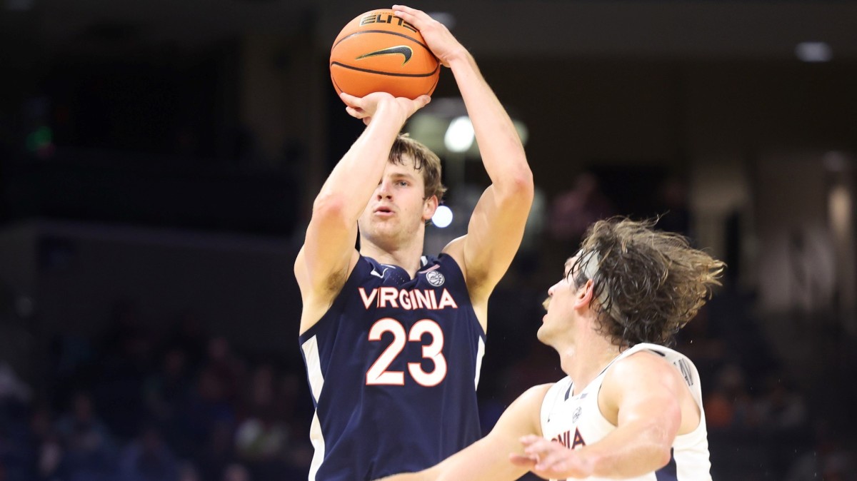 Isaac Traudt attempts a three-pointer during the Virginia men's basketball Blue-White Scrimmage at John Paul Jones Arena.