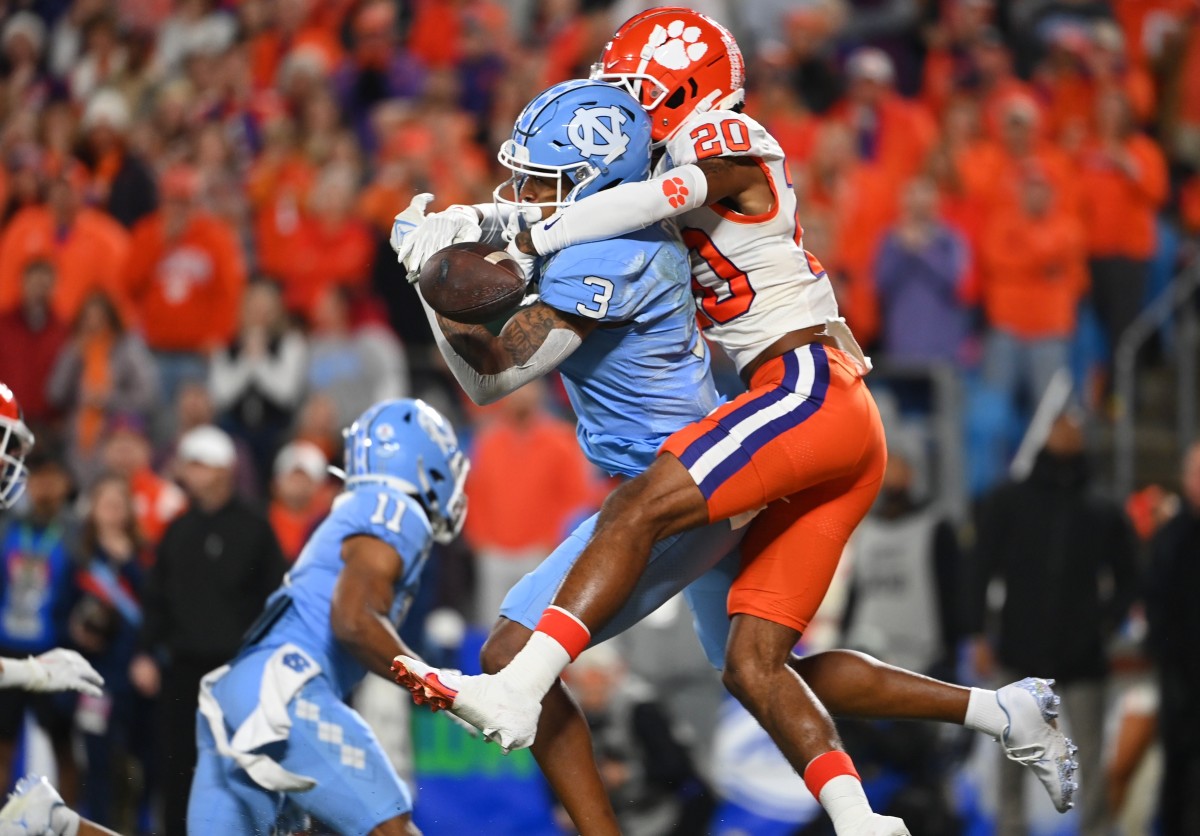 Dec 3, 2022; Charlotte, North Carolina, USA; Clemson Tigers cornerback Nate Wiggins (20) breaks up a pass intended for North Carolina Tar Heels wide receiver Antoine Green (3) during the second quarter of the ACC Championship game at Bank of America Stadium. Mandatory Credit: Bob Donnan-USA TODAY Sports