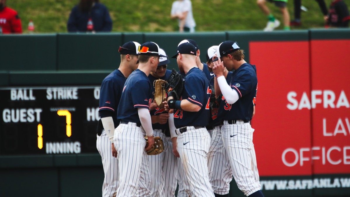 The Virginia baseball team huddles during the game against NC State in Raleigh.