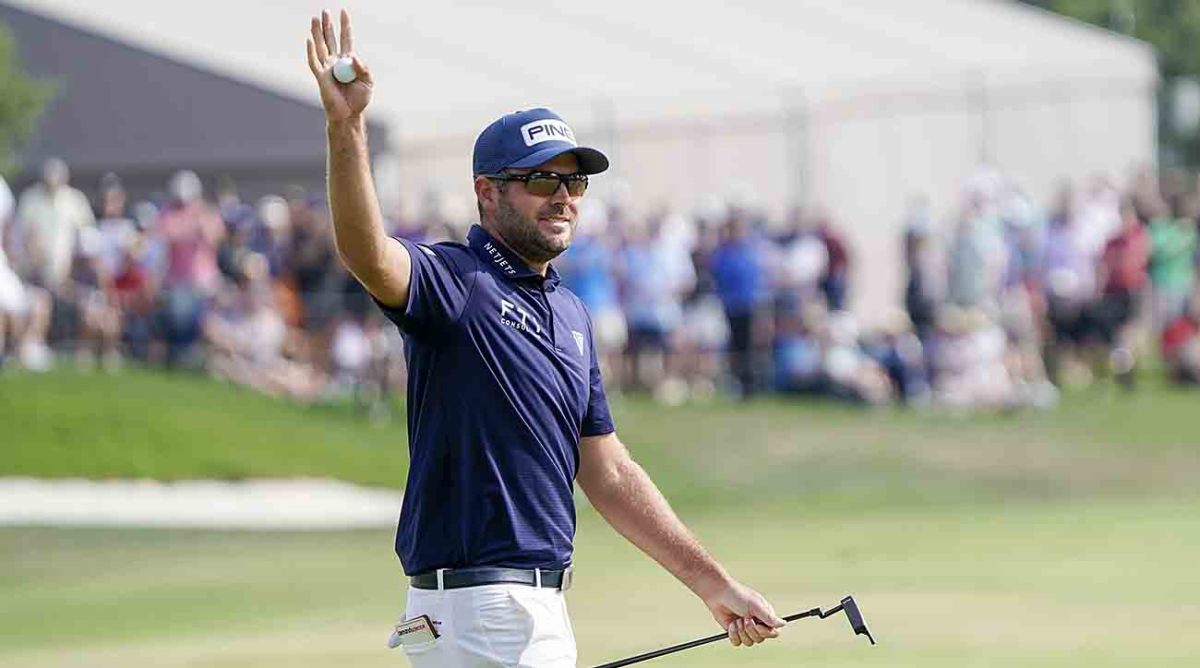 Corey Conners acknowledges the crowd after winning the 2023 Valero Texas Open.