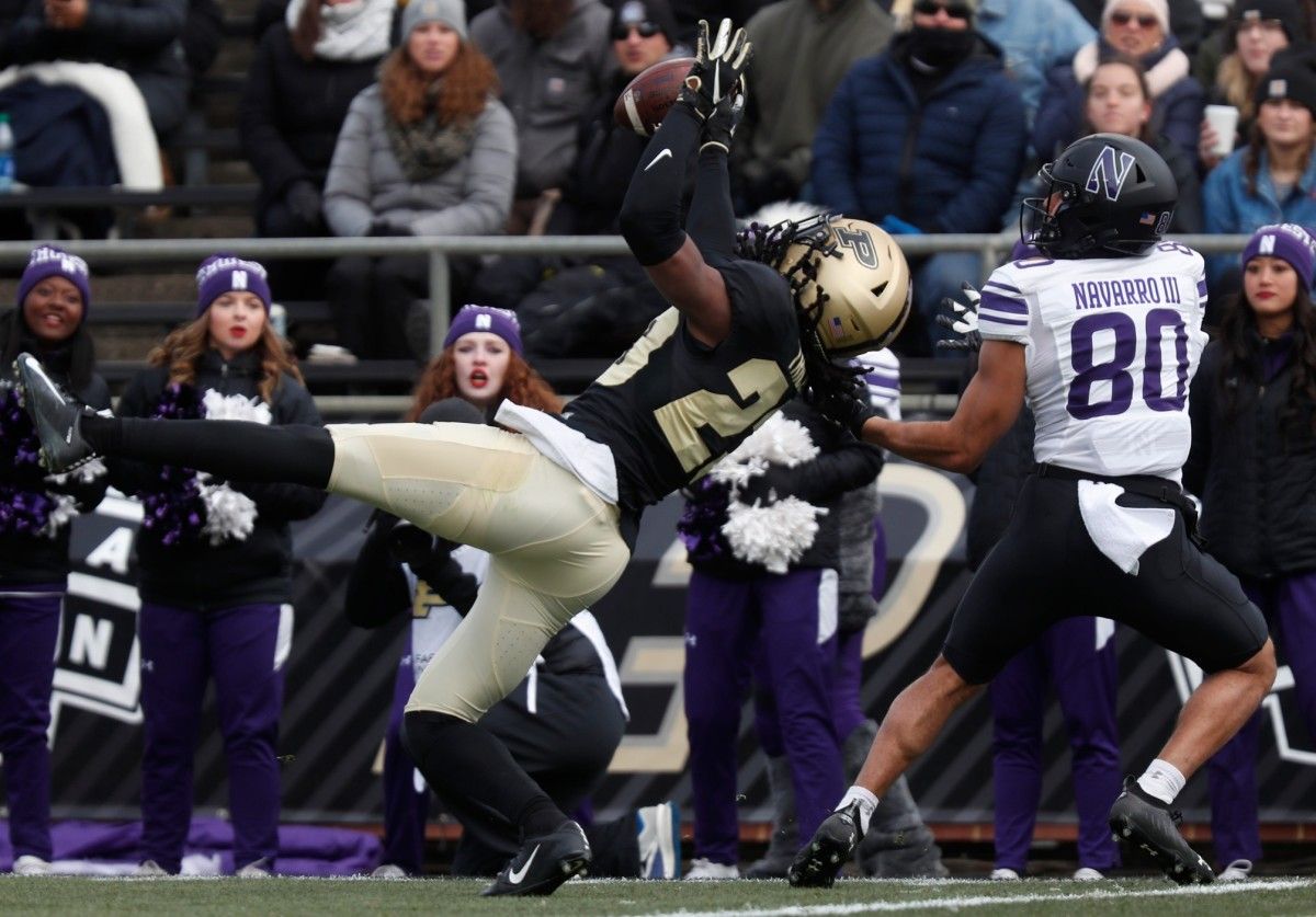 Purdue Boilermakers cornerback Cory Trice (23) deflects the pass intended for Northwestern Wildcats wide receiver Donny Navarro III (80) during the NCAA football game, Saturday, Nov. 19, 2022, at Ross-Ade Stadium in West Lafayette, Ind. Purdue won 17-9. Purduenorthwesternfb111922 Am36836