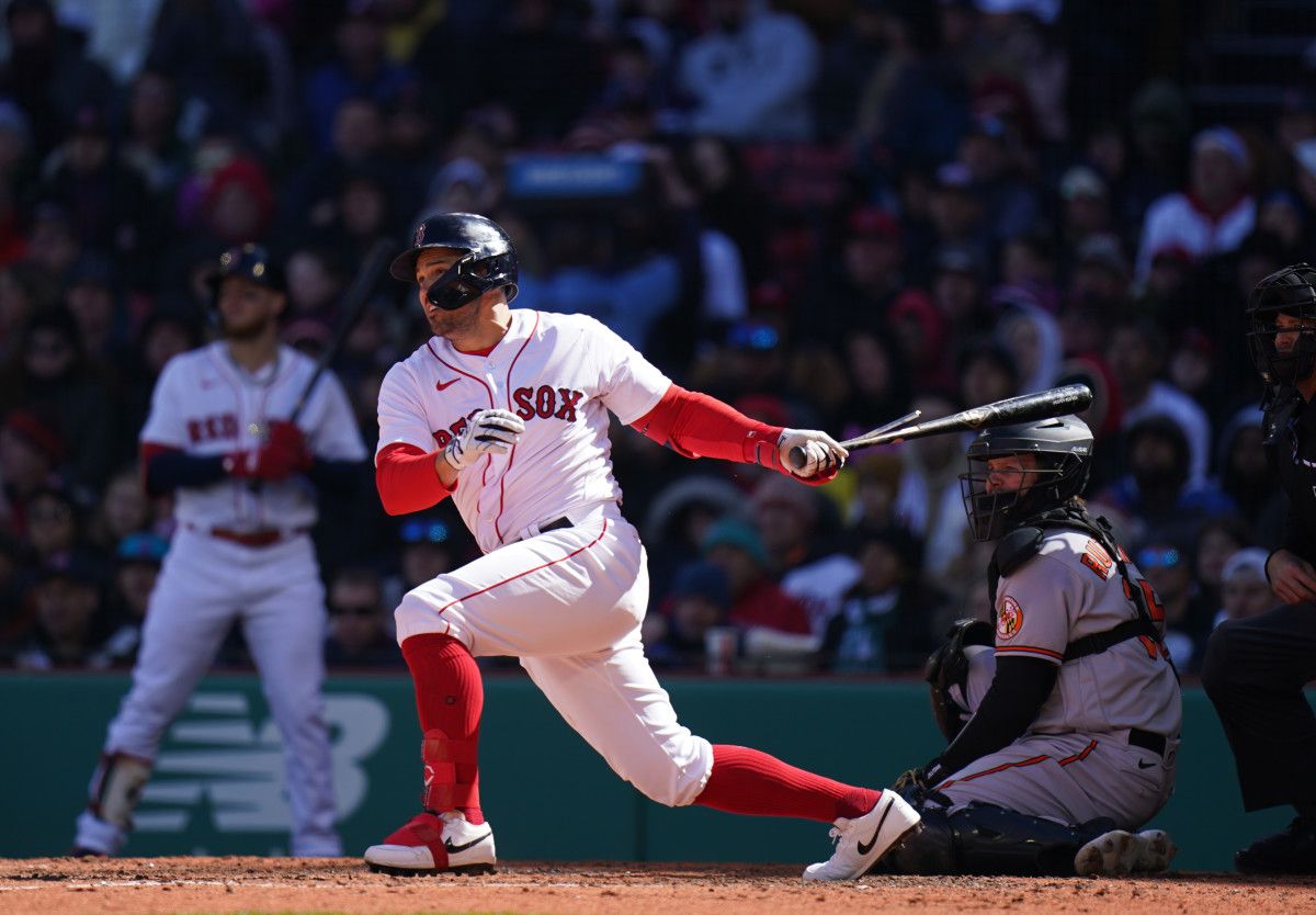 Boston Red Sox center fielder Adam Duvall gets a hit to drive win two runs against the Baltimore Orioles. (2023)