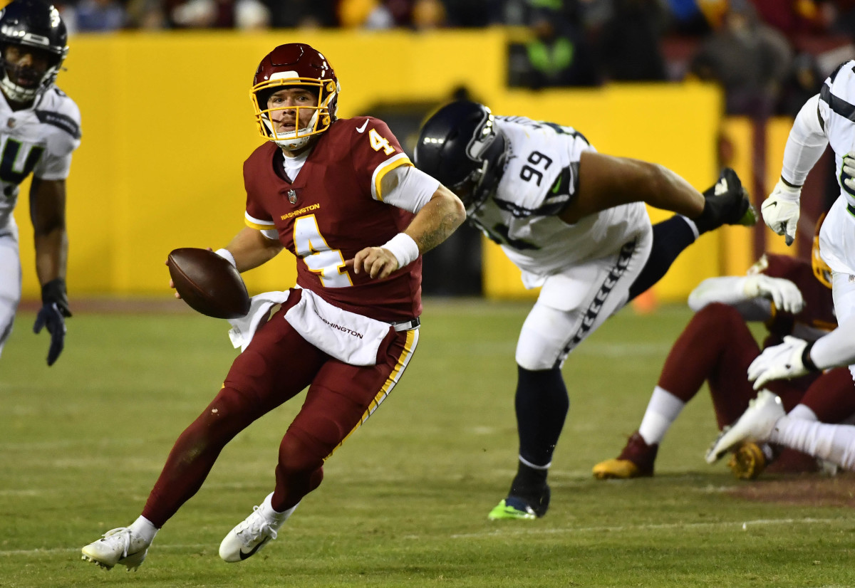 DT Al Woods pursues Washington QB Taylor Heinicke