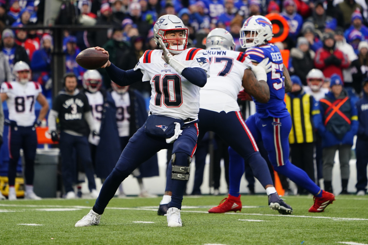 New England Patriots quarterback Mac Jones throws the ball
