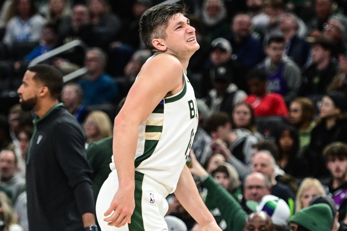 Milwaukee Bucks guard Grayson Allen (12) leaves the game after an injury