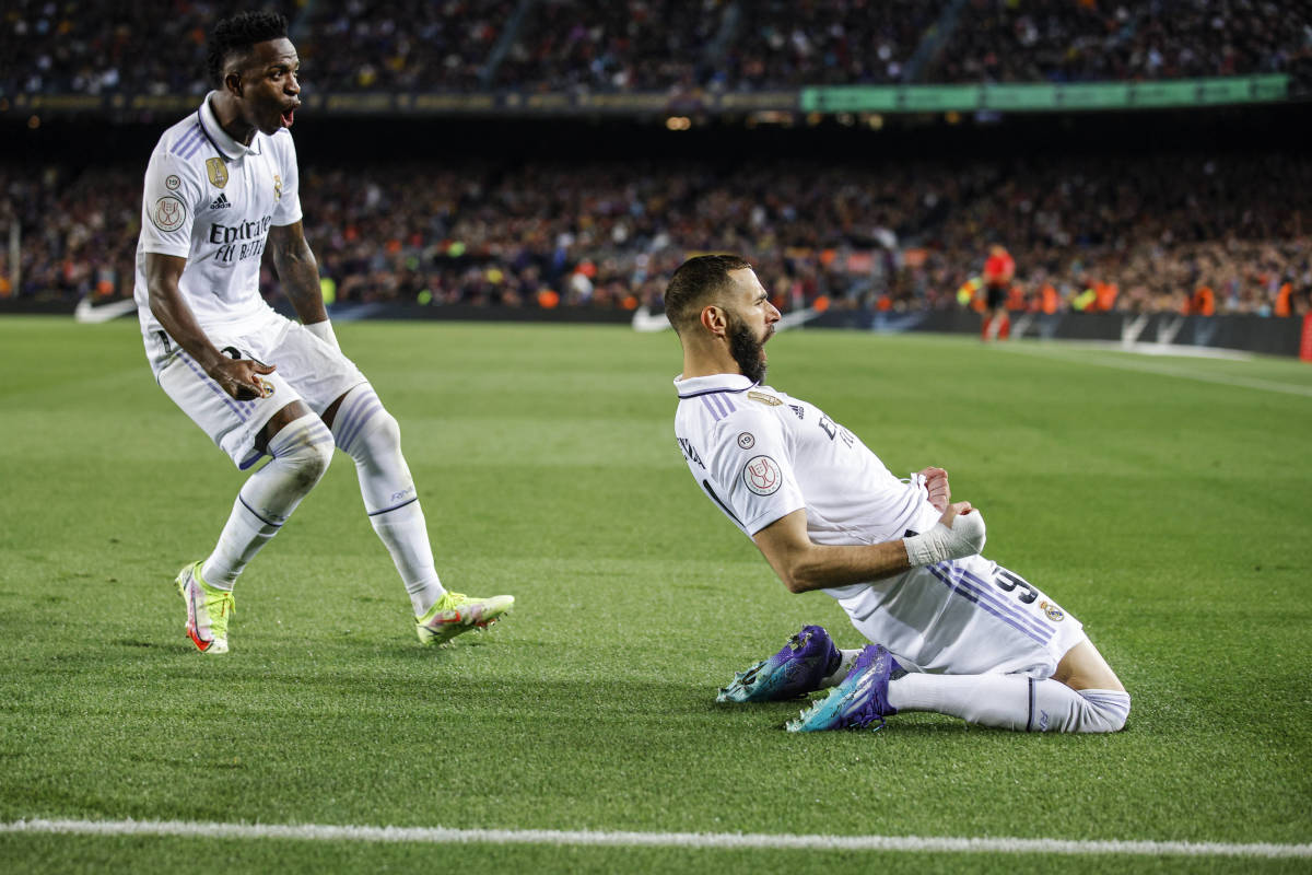 Karim Benzema pictured (right) celebrating after scoring for Real Madrid against Barcelona in the semi-finals of the Copa del Rey in April 2023
