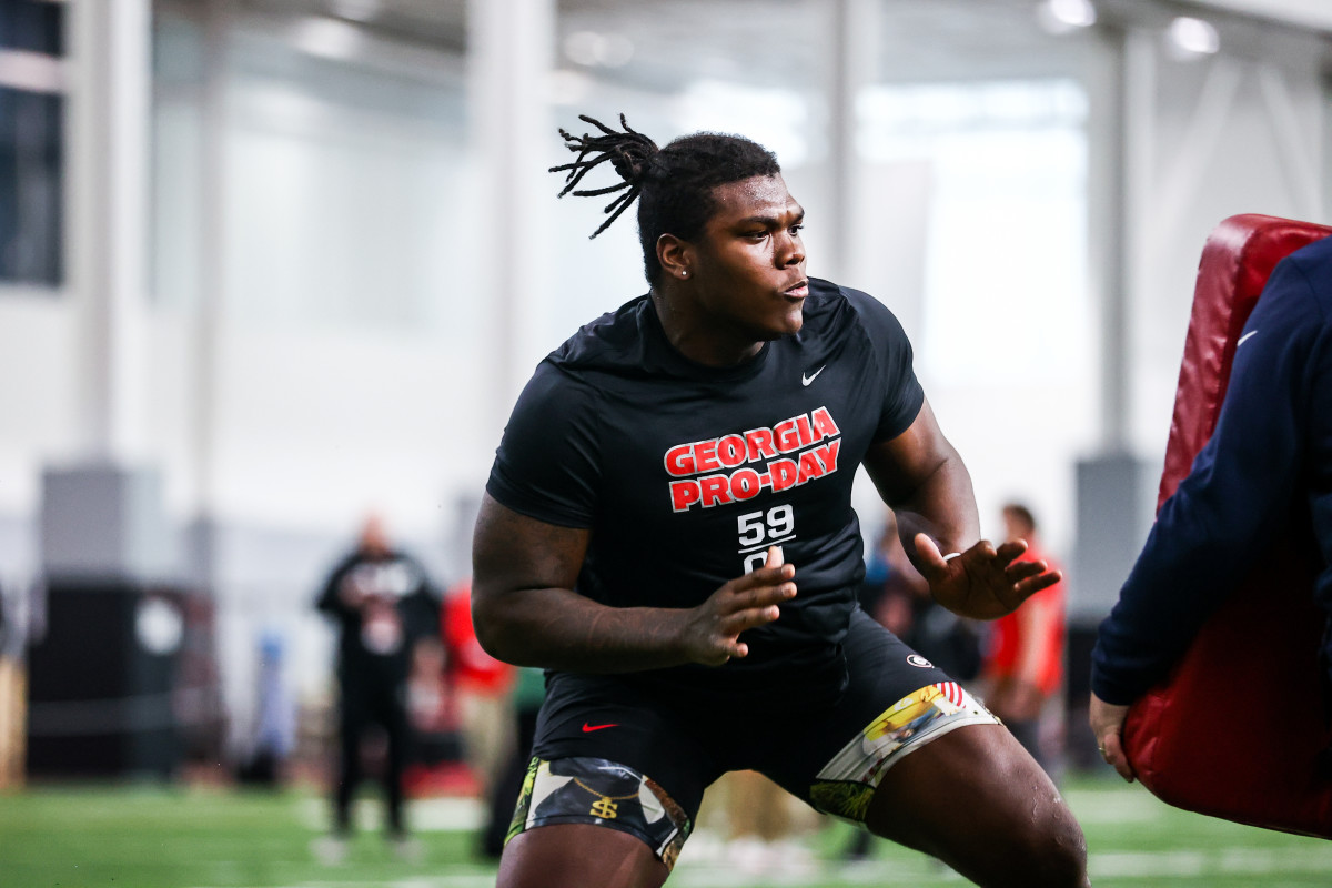 OT Broderick Jones participates in drills during Georgia's Pro Day in March. Credit: Tony Walsh/UGAA