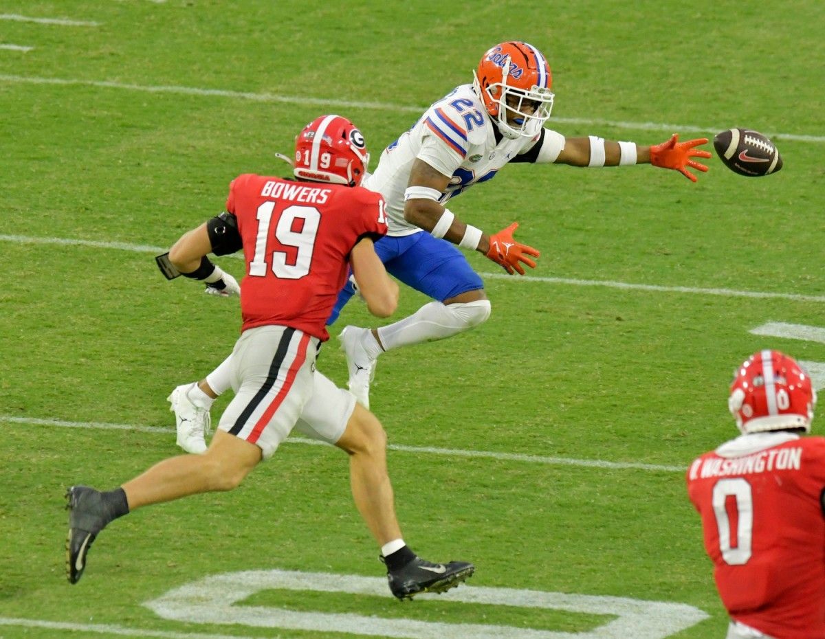 Florida Gators safety Rashad Torrence II (22) stretches for an overthrown Georgia pass during third quarter action. The annual Georgia vs Florida football rivalry was held at TIAA Bank Field in Jacksonville, FL Saturday, October 29, 2022. The Bulldogs went in at halftime with a 28 to 3 lead over the Gators. [Bob Self/Florida Times-Union] Jki 102822 Bs Georgia Vs Florida Football Game 2nd Half 04