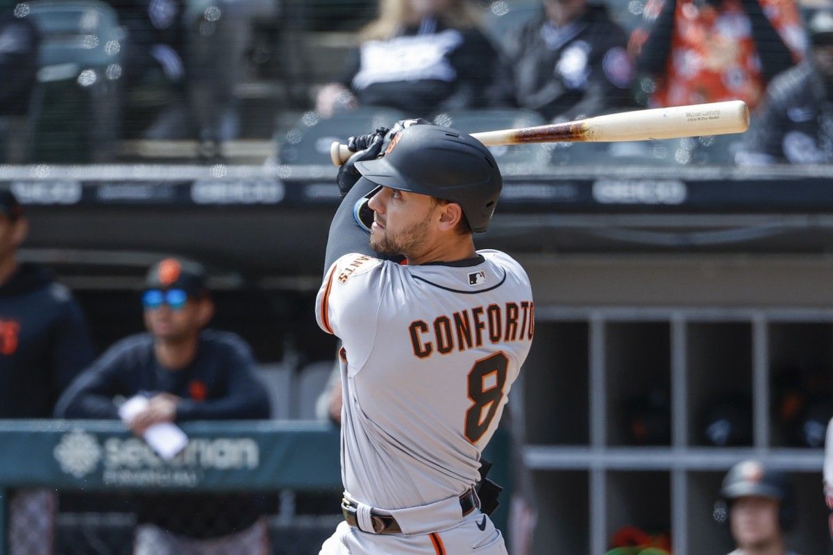 Michael Conforto swings a bat against the Chicago White Sox.