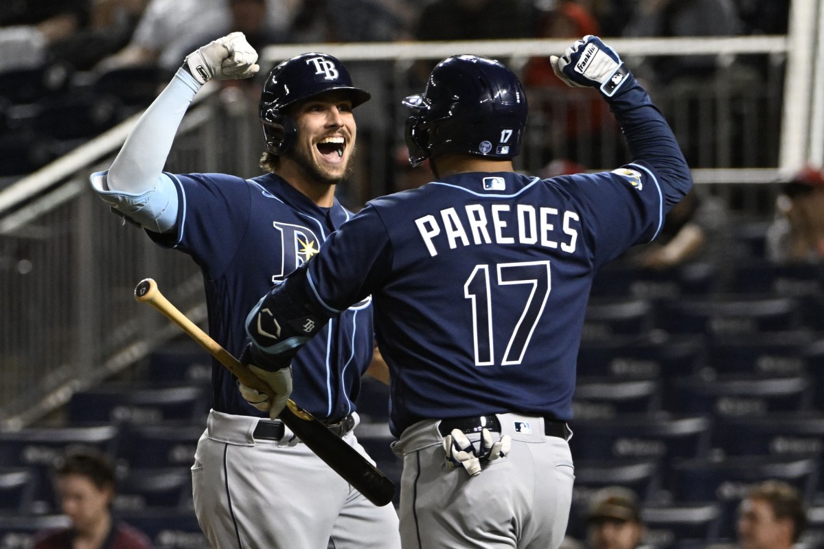 Tampa Bay's Josh Lowe (15) celebrates with Isaac Paredes (17) after hitting a solo home run in the ninth inning against the Washington Nationals in Tuesday's win. (Brad Mills-USA TODAY Sports)