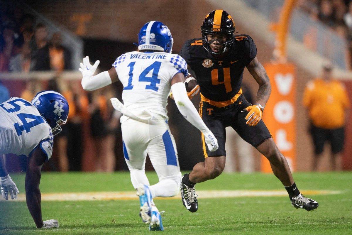 Tennessee wide receiver Cedric Tillman (4) tries to get around Kentucky defensive back Carrington Valentine (14) during the NCAA college football game between Tennessee and Kentucky on Saturday, October 29, 2022 in Knoxville, Tenn. Utvkentucky1029