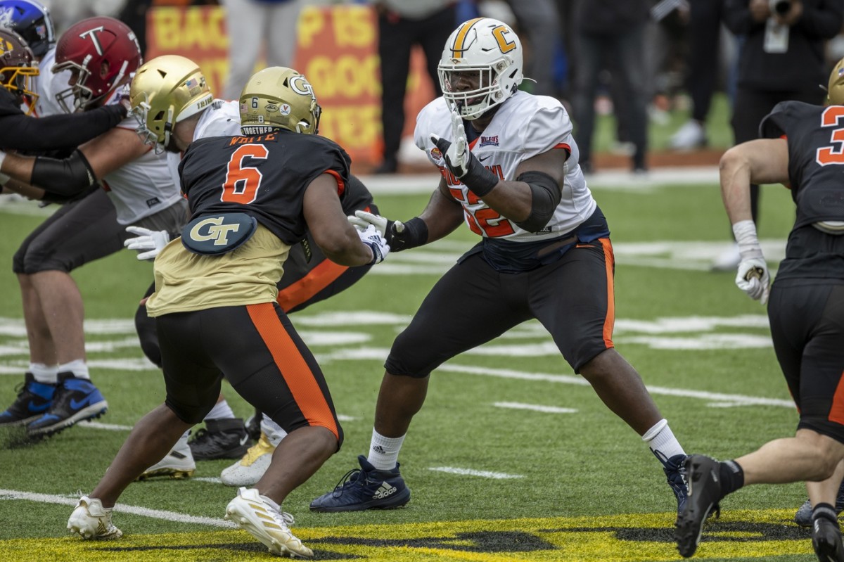 Feb 1, 2023; National offensive lineman McClendon Curtis of UT-Chattanooga (52) practices with National defensive lineman Keion White of Georgia Tech (6) during Senior Bowl week. Mandatory Credit: Vasha Hunt-USA TODAY Sports