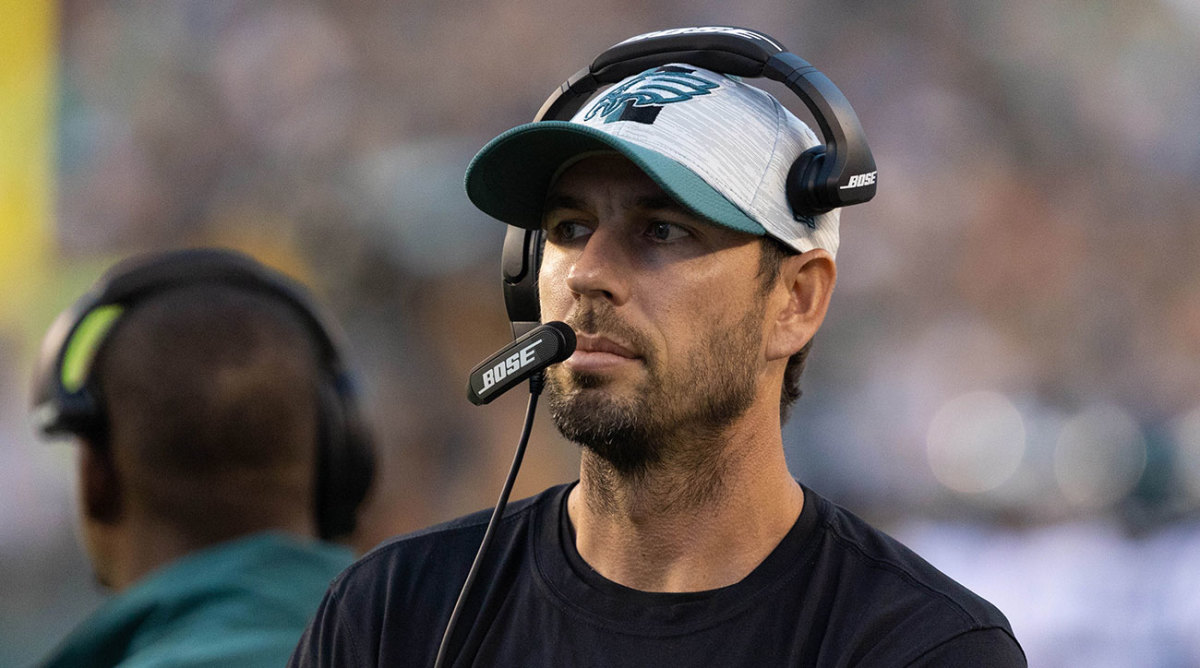 Eagles OC Shane Steichen wearing a headset during a game.