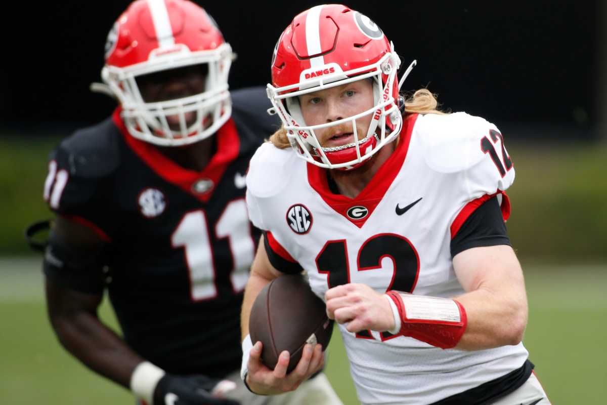Georgia quarterback Brock Vandagriff (12) moves the ball down the field during the G-Day spring football game in Athens, Ga., on Saturday, April 16, 2022. The black team won 26-23. News Joshua L Jones Syndication Online Athens
