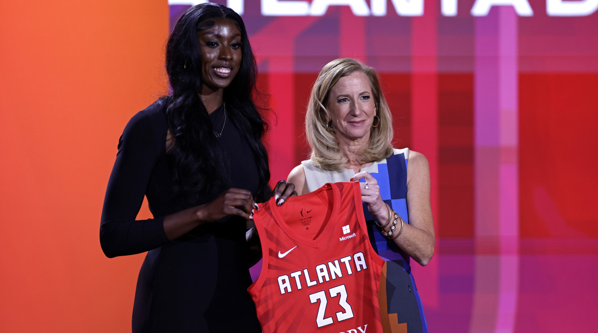 South Carolina’s Laeticia Amihere poses for a photo with commissioner Cathy Engelbert after being selected by the Atlanta Dream at the 2023 WNBA draft.