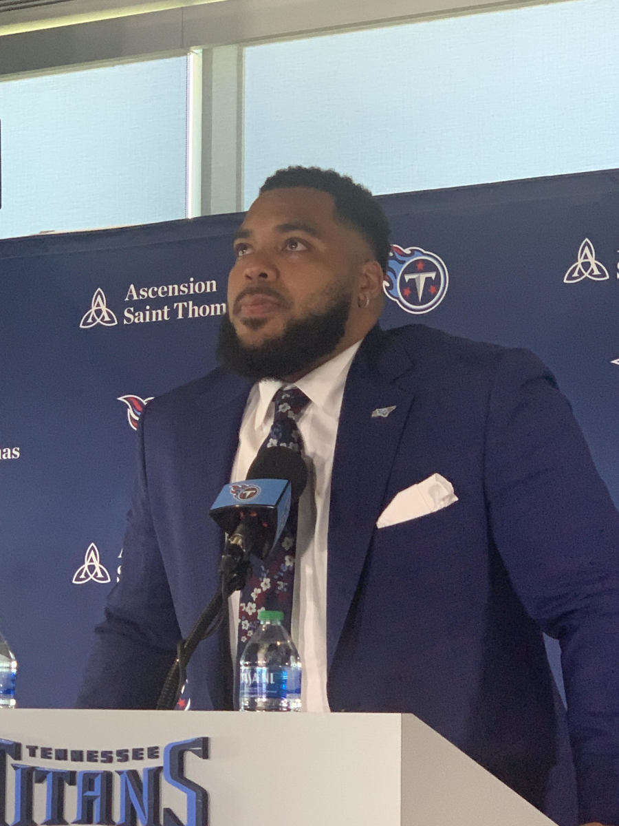 An emotional Jeffery Simmons pauses to compose himself during Wednesday's press conference announcing his new contract extension with the Tennessee Titans.  