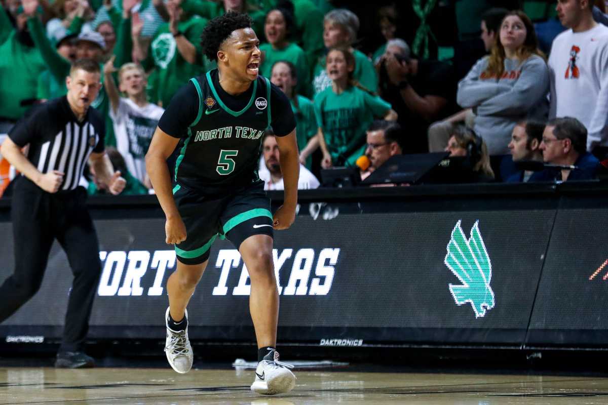 North Texas guard Tylor Perry (5) celebrates in overtime during a college basketball game in the quarterfinals of the National Invitational Tournament between the Oklahoma State Cowboys (OSU) and the North Texas Mean Green at Gallagher-Iba Arena in Stillwater, Okla., Tuesday, March 21, 2023.