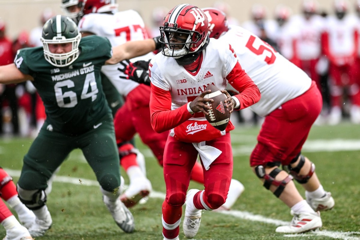 Indiana's Dexter Williams II looks to throw against Michigan State during the third quarter on Saturday, Nov. 19, 2022, at Spartan Stadium in East Lansing.