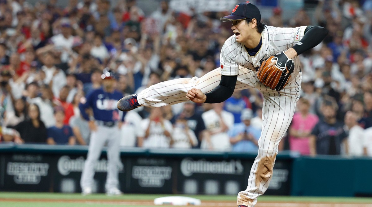 Japan designated hitter and closing pitcher Shohei Ohtani pitches against the USA.