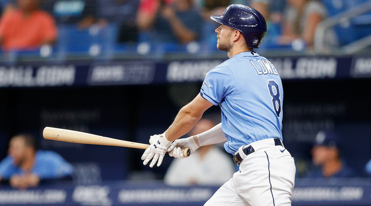 Rays second baseman Brandon Lowe hits a home run.