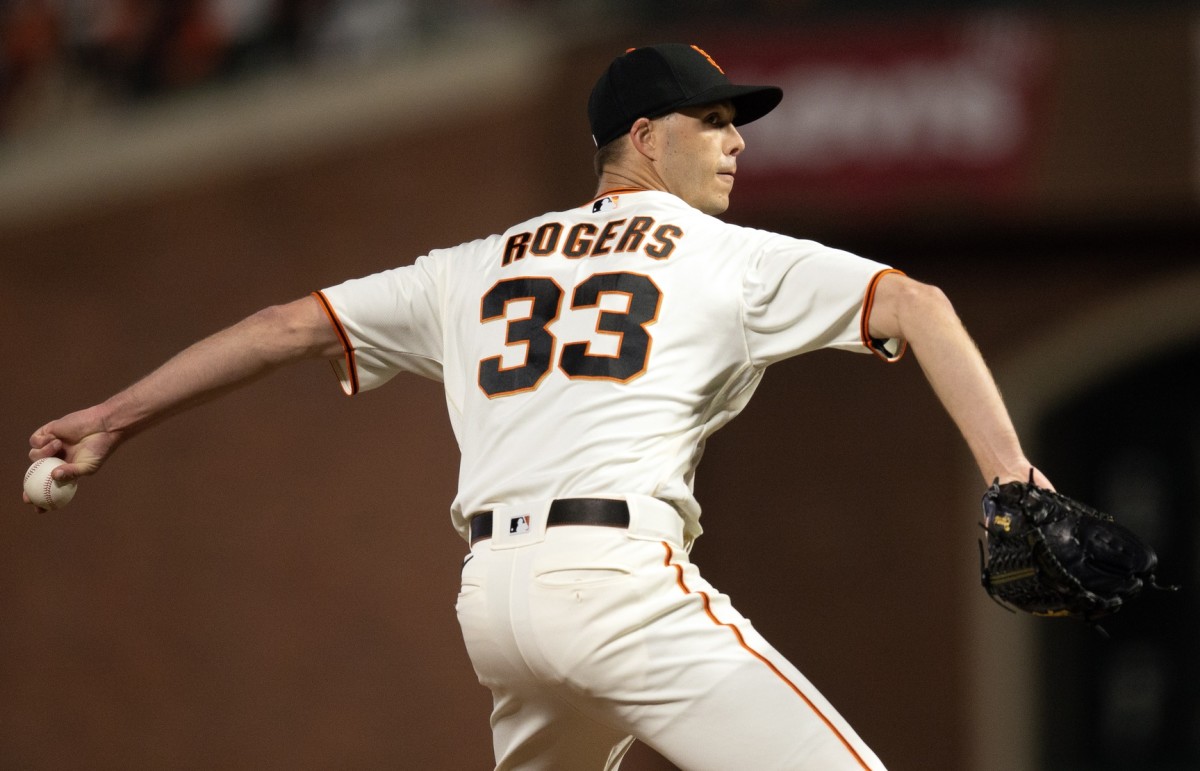 SF Giants reliever Taylor Rogers throws a pitch against the LA Dodgers in a 10-5 loss at home. (2023)