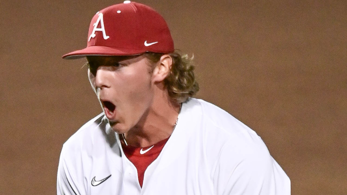Razorbacks' Hagen Smith celebrates closing out 5-2 win over Tennessee to start series.