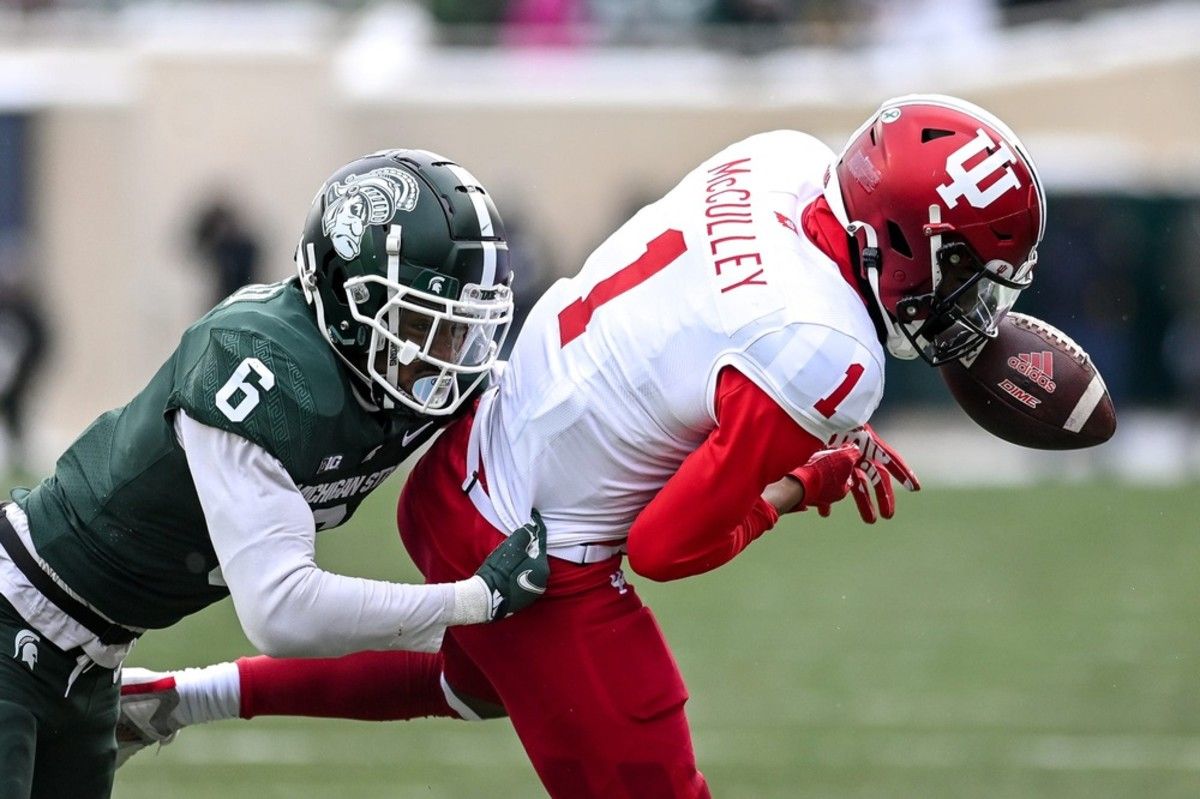Michigan State's Ameer Speed, left, breaks up a pass intended for Indiana's Donaven McCulley during the third quarter on Saturday, Nov. 19, 2022, at Spartan Stadium in East Lansing. 221119 Msu Indiana 141a